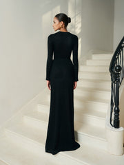 Full-length embellished evening dress with long sleeves and fitted silhouette