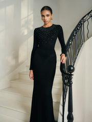 Full-length embellished evening dress with long sleeves and fitted silhouette