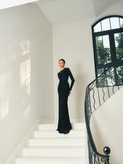 Full-length embellished evening dress with long sleeves and fitted silhouette