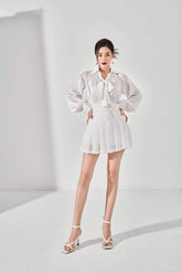 Silk blouse with neck tie and voluminous bishop sleeves for elevated day-to-night styling