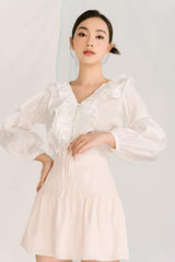 Sheer organza blouse with ruffle trim and voluminous balloon sleeves