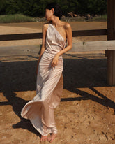 Velvet pleated one-shoulder gown with ruched waist and flowing asymmetric hemline