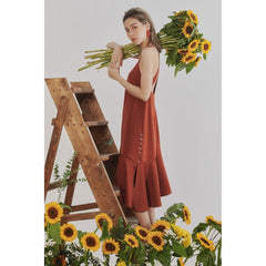 Silk slip dress with flared hem and double-strap open back for a sleek, modern silhouette