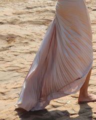 Velvet pleated one-shoulder gown with ruched waist and flowing asymmetric hemline