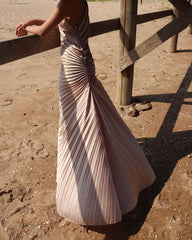 Velvet pleated one-shoulder gown with ruched waist and flowing asymmetric hemline
