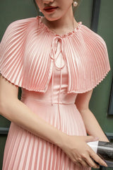 Sleeveless pleated midi silk dress with structured cape and cinched waist
