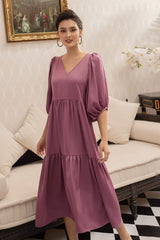 Flowy silk midi dress with puffed three-quarter sleeves and gathered tiered silhouette