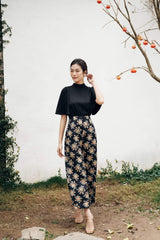 Structured silk blouse with short flared sleeves and high neckline for elegant styling