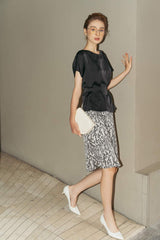 Short-sleeve silk blouse with boat neckline and belted waist for a sculpted silhouette