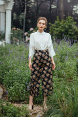 Silk button-down blouse with relaxed fit and cropped sleeves for versatile everyday wear