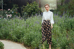 Silk button-down blouse with relaxed fit and cropped sleeves for versatile everyday wear