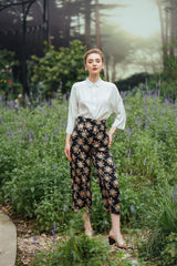 Silk button-down blouse with relaxed fit and cropped sleeves for versatile everyday wear