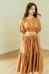 Silk midi dress with puffed sleeves and tiered skirt for soft volume and feminine elegance