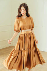 Silk midi dress with puffed sleeves and tiered skirt for soft volume and feminine elegance