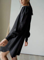 Long-sleeve pleated front A-line mini dress crafted from smooth silk fabric