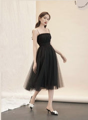 Sleeveless organza midi dress with ruched bodice and full A-line silhouette