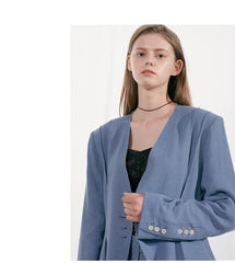Tailored Linen Blazer with Asymmetric Button Detail and Elongated Silhouette