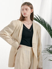 Tailored Linen Blazer with Asymmetric Button Detail and Elongated Silhouette