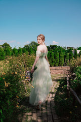 Robe longue en tulle à manches bouffantes et col Bardot Katrina