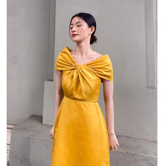 Off-shoulder silk midi dress with knotted front detail and elegant A-line silhouette