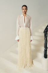 Sheer blouse with oversized cuffs and pointed collar for elevated styling