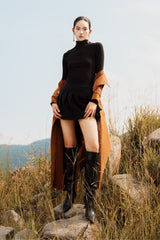 Fitted high-neck knitted wool top with long sleeves and seamless contour finish