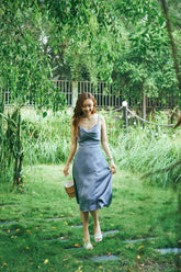 Silk slip midi dress with cowl neckline and adjustable straps for graceful summer styling