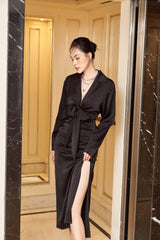 Silk midi dress with deep V-neck, front tie detail, and thigh-high slit for evening elegance