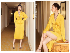 Silk midi dress with front tie detail, deep neckline, and long sleeves for statement evenings