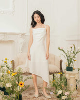 Silk cowl neck midi dress with asymmetric hem and adjustable tie shoulder straps