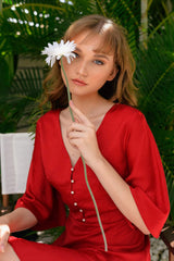 Silk midi dress with V-neckline, pearl buttons and asymmetric ruffle hem detail