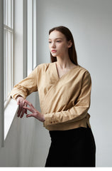 Relaxed Linen Wrap Blouse with Buttoned Cuffs