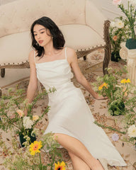 Silk cowl neck midi dress with asymmetric hem and adjustable tie shoulder straps