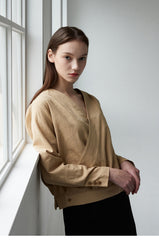 Relaxed Linen Wrap Blouse with Buttoned Cuffs
