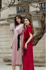 V-neck silk midi dress with short sleeves and side tie detail for elegant everyday wear