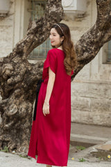 V-neck silk midi dress with short sleeves and side tie detail for elegant everyday wear