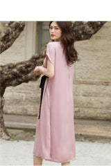 V-neck midi silk dress with short sleeves and contrast tie waist detail for elegant styling