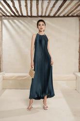 Halter Neck Pleated Midi Dress in Flowing Silk with Elegant A-Line Silhouette
