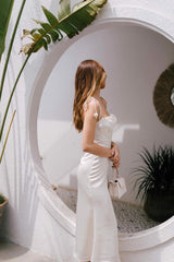 Silk midi dress with ruched bust, corset waist, and adjustable tie shoulder straps