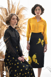 Sheer chiffon organza blouse with classic collar and soft structured silhouette