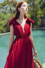 Sleeveless pleated silk maxi dress with ruffle shoulder detail and deep V neckline