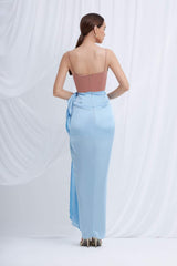Silk draped maxi skirt with high slit and gathered wrap detail at the waist