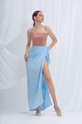 Silk draped maxi skirt with high slit and gathered wrap detail at the waist