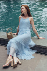 Tiered pleated midi organza dress with spaghetti straps and flowy silhouette