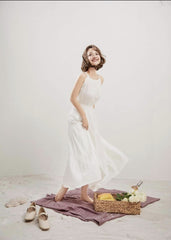 Robe longue sans manches à volants en soie légère avec corsage froncé et ourlet fluide