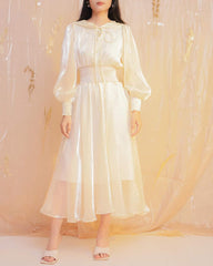 Flowy organza midi dress with puff sleeves and smocked waist for elegant movement