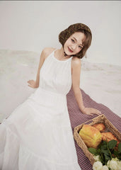 Robe longue sans manches à volants en soie légère avec corsage froncé et ourlet fluide