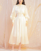 飘逸的欧根纱中长连衣裙,泡泡袖和褶饰腰部,让您行动优雅