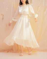 Flowy organza midi dress with puff sleeves and smocked waist for elegant movement