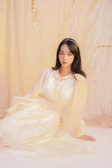 Flowy organza midi dress with puff sleeves and smocked waist for elegant movement